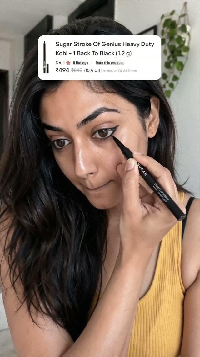 Woman demonstrating a black eyeliner in a direct-response beauty ad